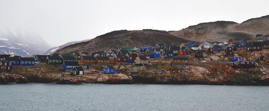 Village on shores of Greenland, kayaking