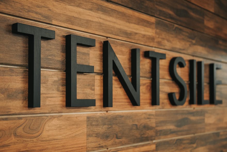 Tentsile logo - wooded background